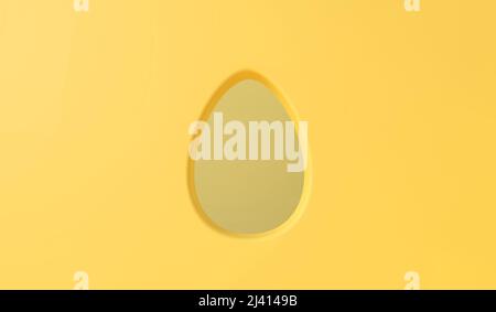 Buco a forma di uovo di Pasqua in uno sfondo parete. 3D rendering Foto Stock
