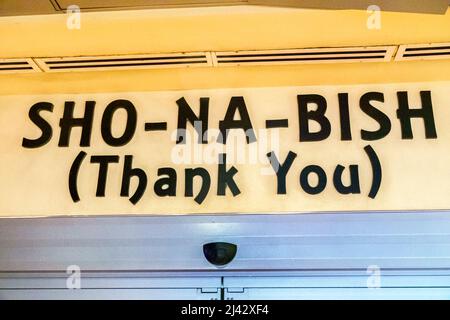 Hollywood Florida Seminole Hard Rock Hotel & Casino tribe tribal prenotazione all'interno bilingue grazie segno inglese indiano Foto Stock