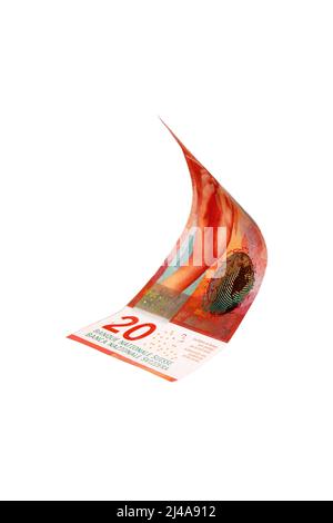 Volare denaro svizzero - 20 franchi nota isolato con il percorso di clipping Foto Stock