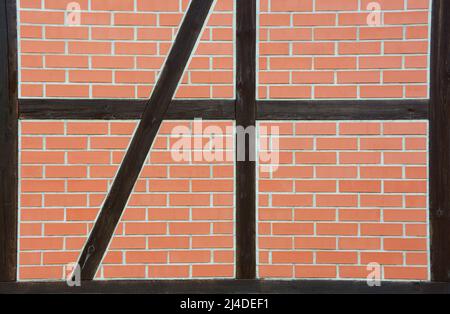 Muro di mattoni a metà legno Foto Stock