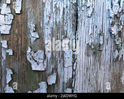Texture, pattern, background. Vernice vecchia. Calcestruzzo parete incrinato vernice, vernice astrattamente dietro il calcestruzzo. Con la vernice bianca si sfalda nel tempo Foto Stock