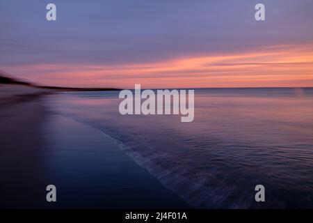 North Coogee spiaggia, tramonto, lunga esposizione Foto Stock