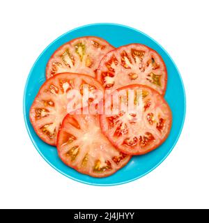 Grande pomodoro coltivato in terra dalle isole Canarie isolato su bianco Foto Stock