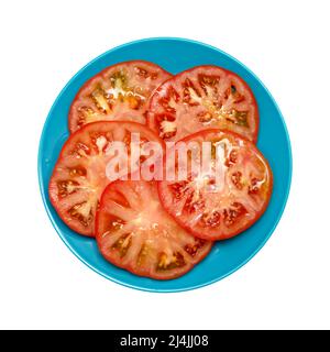 Grande pomodoro coltivato in terra dalle isole Canarie isolato su bianco Foto Stock