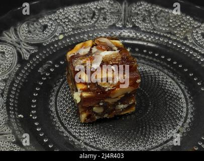 halwa di frutta secca in un piatto Foto Stock