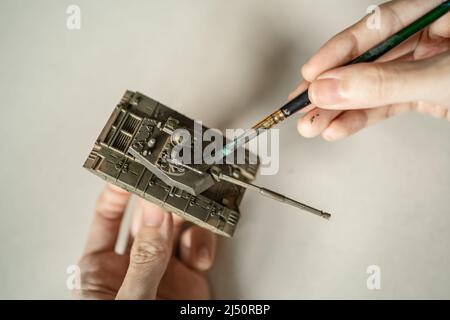 Serbatoio di verniciatura modello in plastica con spazzola Foto Stock