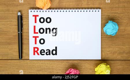 TLTR troppo lungo per leggere il simbolo. Parole concettuali TLTR troppo lungo per leggere sulla nota su uno sfondo bianco bello. TLTR aziendale troppo lungo per leggere il concetto. Foto Stock