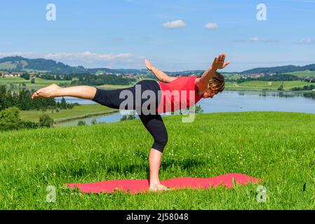 Rafforzamento del corpo con metodo pilates Foto Stock