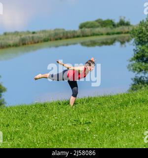 Rafforzamento del corpo con metodo pilates Foto Stock