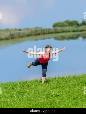 Rafforzamento del corpo con metodo pilates Foto Stock