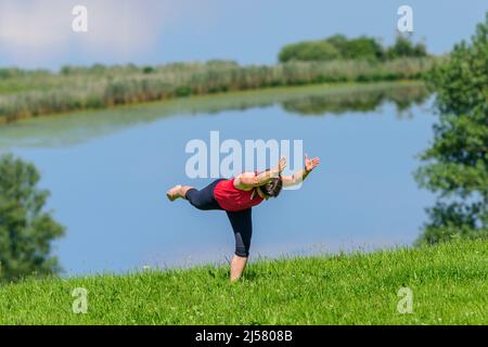 Rafforzamento del corpo con metodo pilates Foto Stock