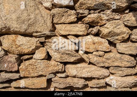 Muratura a secco muro di pietra closeup come sfondo Foto Stock