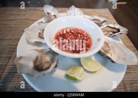 Ostriche per antipasti al J W Marriott Cafe Bangkok Thailandia Foto Stock