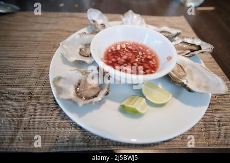 Ostriche per antipasti al J W Marriott Cafe Bangkok Thailandia Foto Stock