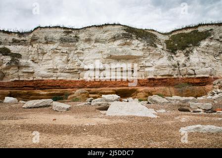 L'iconico faro di Old Hunstanton al tramonto. Foto Stock