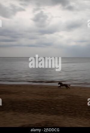 L'iconico faro di Old Hunstanton al tramonto. Foto Stock