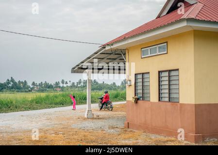 Vita quotidiana nell'area di Balik Pulau, nel distretto sudoccidentale dell'Isola di Penang, nell'Isola di Penang, in Malesia Foto Stock