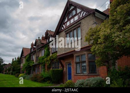 Case di arte e artigianato in giardino villaggio di Port Sunlight, Birkenhead, Wirral, Regno Unito Foto Stock