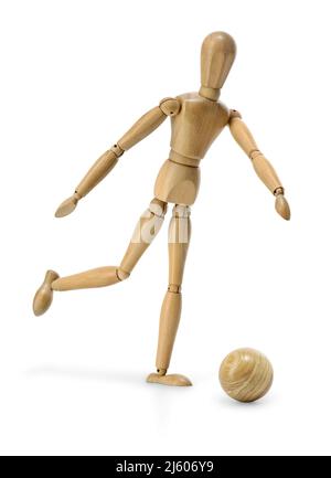 Un manichino in legno gioca a calcio Foto Stock