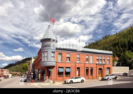 L'incrocio tra Sesto e Bank Street a Wallace, Idaho, Stati Uniti. Gli edifici raffigurati fanno parte del Wallace Historic District, che io Foto Stock