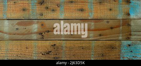 Tavole di legno grungy con texture ruvida e vernice come sfondo Foto Stock