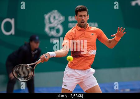 Novak Djokovic della Serbia reagisce contro Andrey Rublev della Russia durante la finale Foto Stock