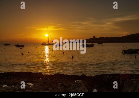 Una sequenza di immagini dell'alba a Qawra St Paul's Bay, Malta Foto Stock