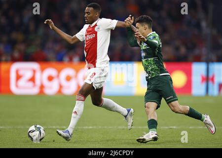 AMSTERDAM - (lr) Ryan Gravenberch di Ajax, Tristan van Gilst o PEC Zwolle durante la partita olandese Eredivie tra Ajax Amsterdam e PEC Zwolle alla Johan Cruijff Arena il 30 aprile 2022 ad Amsterdam, Paesi Bassi. ANP MAURICE VAN STEEN Foto Stock