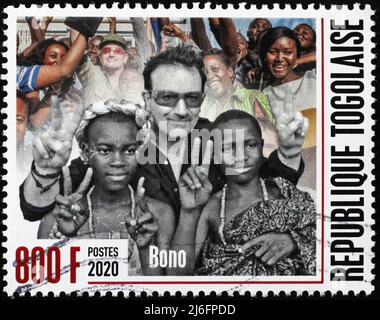 Ritratto di Bono con bambini africani su francobollo Foto Stock