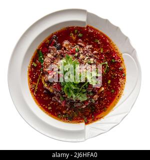 Porzione isolata di carne di manzo piccante sichuan Foto Stock