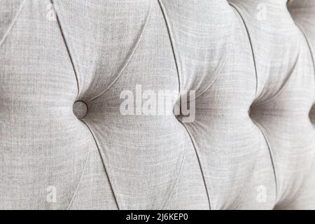 Sfondo di tappezzeria in tufting in diamante beige Foto Stock