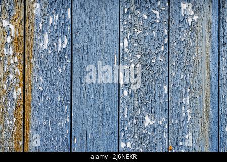 Sfondo dalle tavole. Trama di cracking e peeling vernice su una superficie di legno Foto Stock