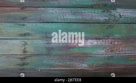 Plancette orizzontali in legno colorato e multicolore affrescato con crepe Foto Stock