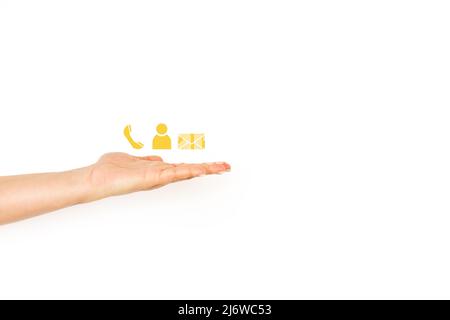 Mano donna che mostra le icone di comunicazione su uno sfondo bianco con spazio di copia Foto Stock