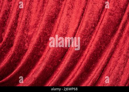 In tessuto rosso sfondo. Texture e pieghe di tessuto rosso, copia dello  spazio Foto stock - Alamy