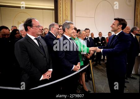 Nicolas Sarkozy, Roselyne Bachelot-Narquin, Elisabeth Borne, Éric Dupond-Moretti, Gérald Darmanin durante la cerimonia di investitura del Presidente francese della Repubblica, Emmanuel Macron al Palazzo dell'Eliseo di Parigi, in Francia, il 7 maggio 2022, dopo la sua rielezione il 24 aprile. Foto di Dominique Jacovides/pool/ABACAPRESS.COM Foto Stock