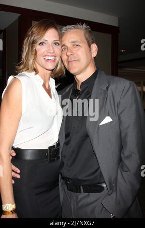 LOS ANGELES - Apr 11: Tricia Helfer, Jonathan Marshall al Long Beach Grand Prix Foundation Gala al Westin Hotel il 11 aprile 2014 a Long Beach, California Foto Stock