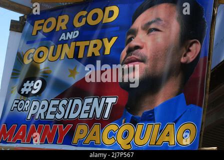 Manny Pacquiao manifesti politici per le elezioni del 2022 nelle Filippine, ILO, Filippine. Foto Stock