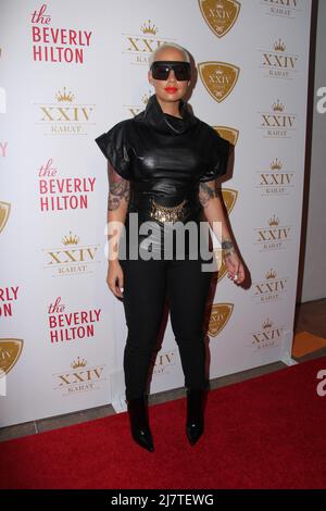 LOS ANGELES - Oct 16: Amber Rose al XXIV Carat Launch Party presso l'hotel Beverly Hilton il 16 ottobre 2014 a Beverly Hills, CA Foto Stock