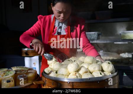 Una pentola di vapore Baozi in Cina. Foto Stock