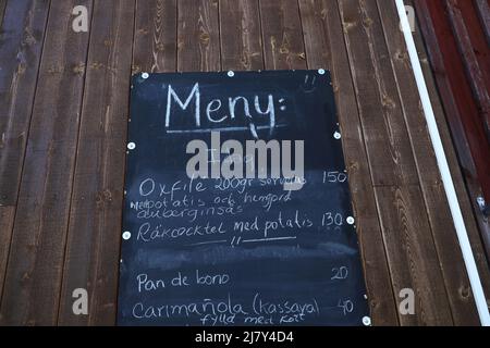 Tempo stagionale, canale di Göta al Glass & Gastrobar di Claudia a Ljung, Svezia, durante il giovedì. Foto Stock