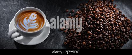 Composizione con una tazza di caffè. Foto Stock