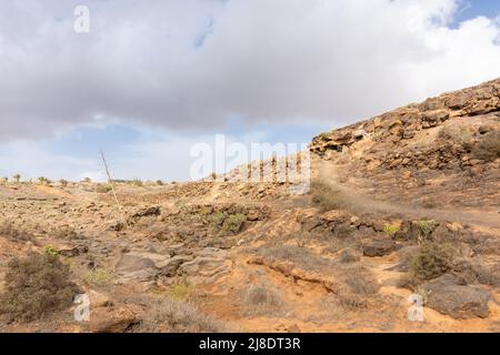 La città stratificata di Lanzarote, un'area vulcanica con formazioni rocciose geologiche, Isole Canarie, Spagna Foto Stock