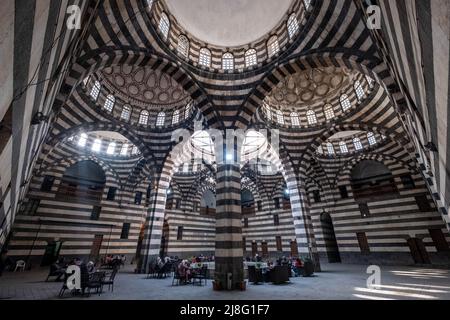 Damasco, Siria - Maggio, 2022: Architettura storica (Khan as'ad Pasha), il più grande caravanserai nella Città Vecchia di Damasco Foto Stock