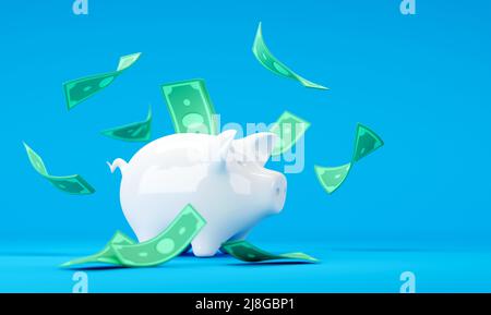 Banca bianca del piggy con le fatture cadenti del dollaro su sfondo blu Foto Stock