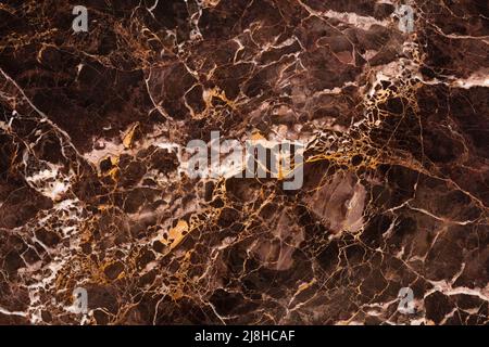 Sfondo in marmo dorato Emperador, texture elegante per progetti d'interni. Foto Stock