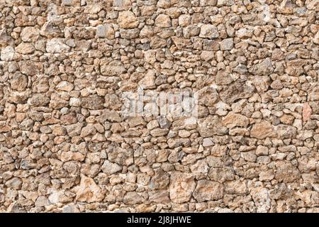 Muro di pietra a secco, muro di pietra a secco. Ripetizione continua (affiancabile) di pattern, texture o sfondo. Foto Stock