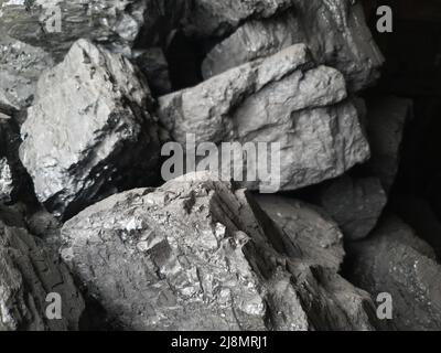 Industria carboniera. Pezzi di carbone nero primo piano. Raccolta di carburante Foto Stock