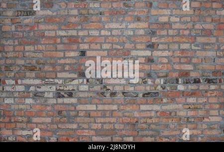 Muro di mattoni rossi di plinto come sfondo Foto Stock