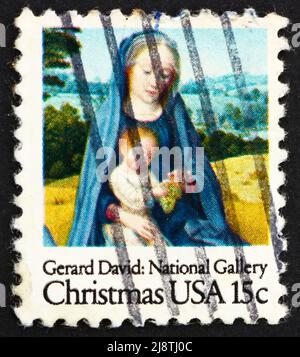 STATI UNITI D'AMERICA - CIRCA 1966: Un francobollo stampato negli Stati Uniti mostra i dettagli di Painting the Rest on the Flight into Egypt di Gerard David, circa Foto Stock